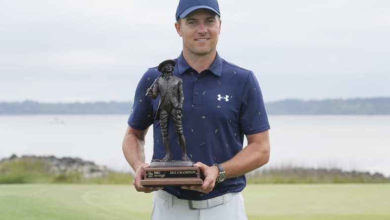 Apr 17, 2022; Hilton Head, South Carolina, USA; Jordan Spieth holds the champions trophy after winning the RBC Heritage golf tournament. Mandatory Credit: David Yeazell-USA TODAY Sports