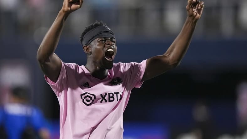 Apr 19, 2022; Miami, Florida, USA; Inter Miami CF defender Aim  Mabika (12) celebrates after defeating Miami FC at Riccardo Silva Stadium. Mandatory Credit: Eric Espada-USA TODAY Sports