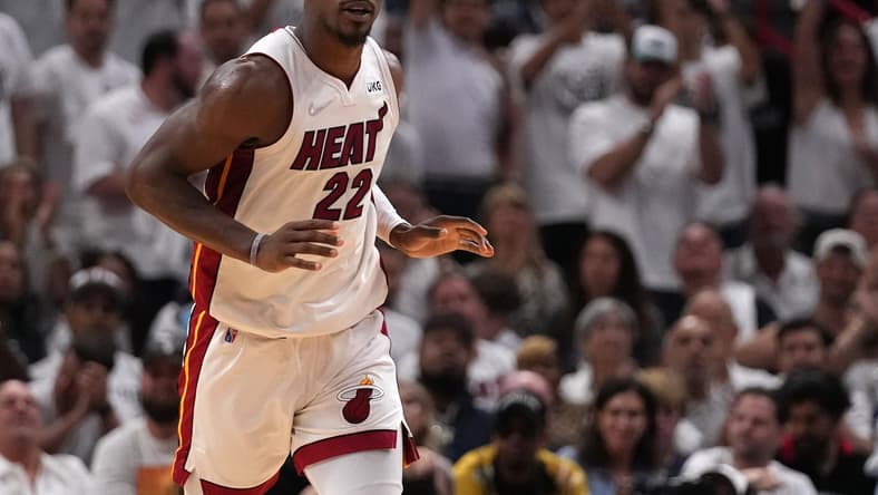 Apr 19, 2022; Miami, Florida, USA; Miami Heat forward Jimmy Butler (22) reacts after scoring against the Atlanta Hawks during the second half in game two of the first round for the 2022 NBA playoffs at FTX Arena. Mandatory Credit: Jasen Vinlove-USA TODAY Sports