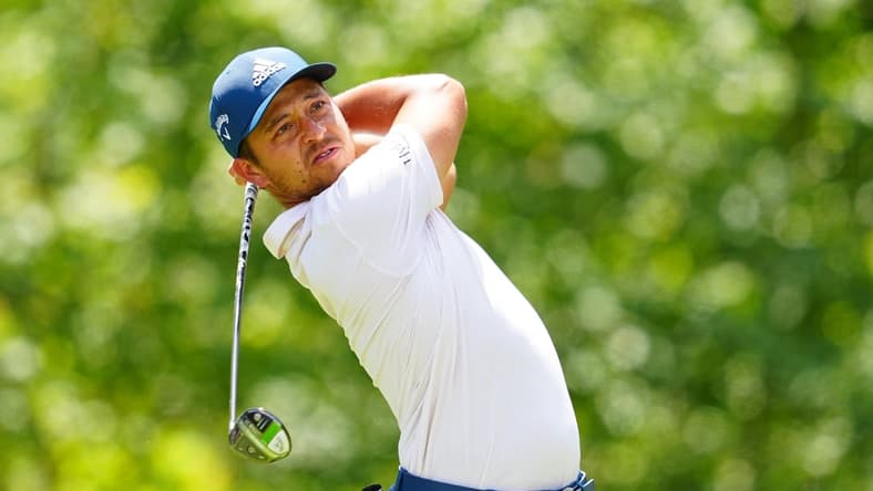 Apr 21, 2022; Avondale, Louisiana, USA; Xander Schauffele plays his shot from the fifth tee during the first round of the Zurich Classic of New Orleans golf tournament. Mandatory Credit: Andrew Wevers-USA TODAY Sports