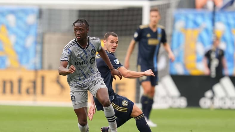 Apr 23, 2022; Chester, Pennsylvania, USA;  CF Montr  al midfielder Isma  l Kon   (28) controls the ball against Philadelphia Union midfielder D  niel Gazdag (6) during the first half at Subaru Park. Mandatory Credit: Mitchell Leff-USA TODAY Sports