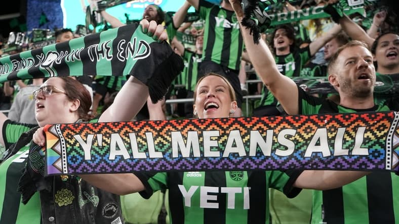 Apr 23, 2022; Austin, Texas, USA; Austin FC fans celebrate the end of their match against the Vancouver Whitecaps at Q2 Stadium. Austin FC won, 3-0. Mandatory Credit: Scott Wachter-USA TODAY Sports
