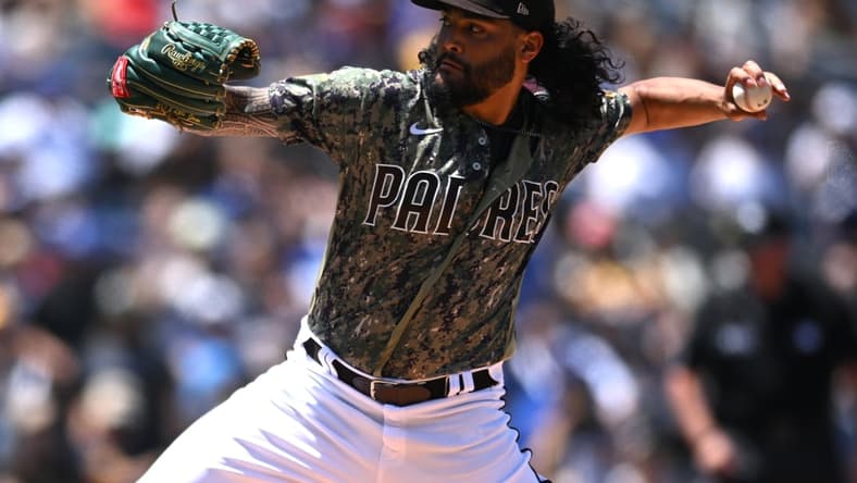 Apr 24, 2022; San Diego, California, USA; San Diego Padres starting pitcher Sean Manaea (55) throws a pitch against the Los Angeles Dodgers during the first inning at Petco Park. Mandatory Credit: Orlando Ramirez-USA TODAY Sports
