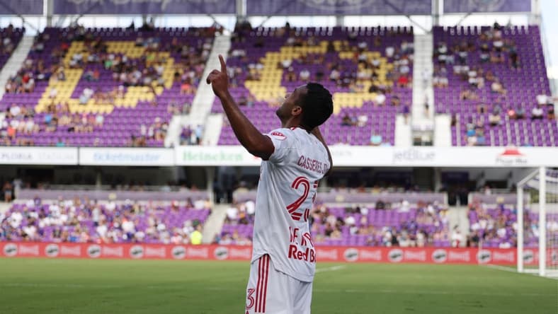 Apr 24, 2022; Orlando, Florida, USA; New York Red Bulls midfielder Cristian Casseres Jr (23) celebrates scoring a goal in the second half against the Orlando City at Exploria Stadium. Mandatory Credit: Nathan Ray Seebeck-USA TODAY Sports