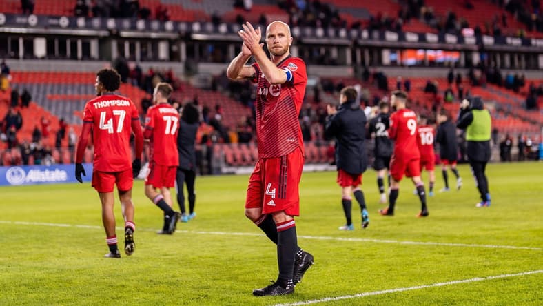 Apr 16, 2022; Toronto, Ontario, CAN; Toronto FC midfielder Michael Bradley (4) celebrates after defeating the Philadelphia Union at BMO Field. Mandatory Credit: Kevin Sousa-USA TODAY Sports