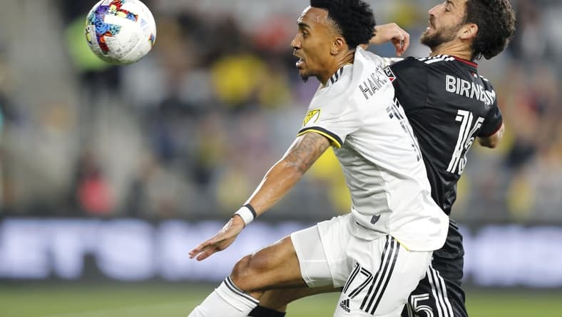 Apr 30, 2022; Columbus, Ohio, USA;  Columbus Crew midfielder Marlon Hairston (17) shields D.C. United defender Steve Birnbaum (15) from the ball during the first half at Lower.com Field. Mandatory Credit: Joseph Maiorana-USA TODAY Sports