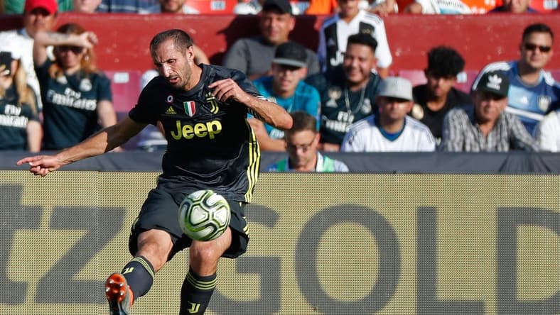 Aug 4, 2018; Landover, MD, USA; Juventus defender Giorgio Chiellini (3) kicks the ball against Real Madrid during an International Champions Cup soccer match at FedEx Field. Mandatory Credit: Geoff Burke-USA TODAY Sports