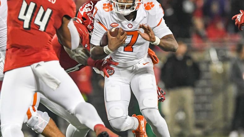 Clemson quarterback Taisun Phommachanh looks for yardage last week after he came in for injured starter D.J. Uiagalelei.

Ncaa Football Clemson At Louisville
