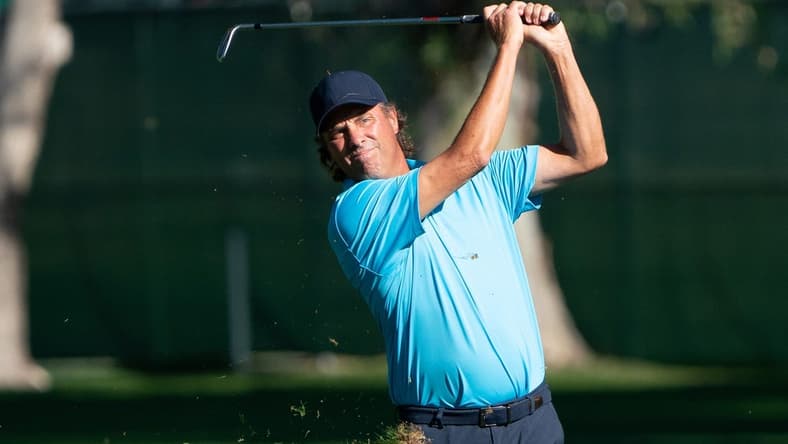 Nov 14, 2021; Phoenix, Arizona, USA; Stephen Ames watches his approach to the ninth during the final round of the Charles Schwab Cup Championship golf tournament at Phoenix Country Club. Mandatory Credit: Allan Henry-USA TODAY Sports
