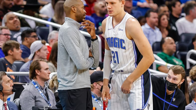 Nov 13, 2021; Orlando, Florida, USA; Orlando Magic head coach Jamahl Mosley talks to center Moritz Wagner (21) during the second quarter at Amway Center. Mandatory Credit: Mike Watters-USA TODAY Sports