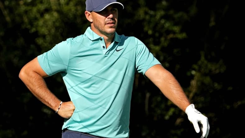 Apr 7, 2022; Augusta, Georgia, USA; Brooks Koepka waits on the 11th tee during the first round of The Masters golf tournament. Mandatory Credit: Michael Madrid-USA TODAY Sports