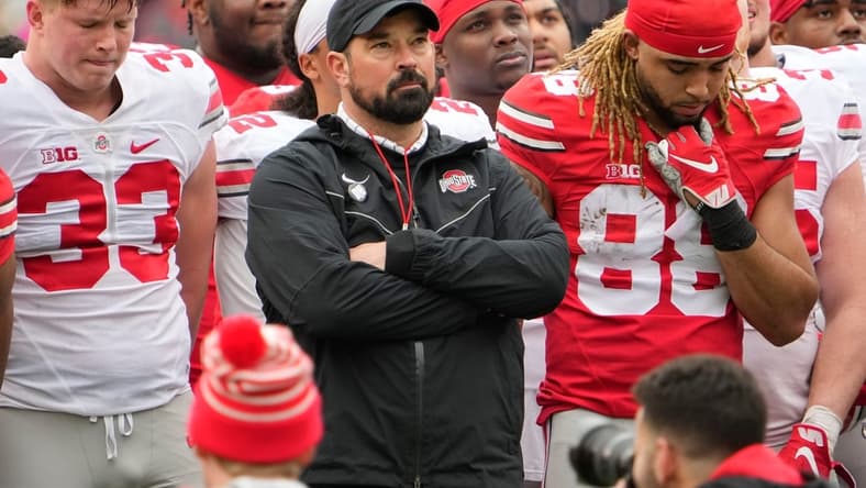 Ohio State Buckeyes head coach Ryan Day and players stand at midfield for a tribute to Dwayne Haskins during the spring football game at Ohio Stadium in Columbus on April 16, 2022.

Ncaa Football Ohio State Spring Game