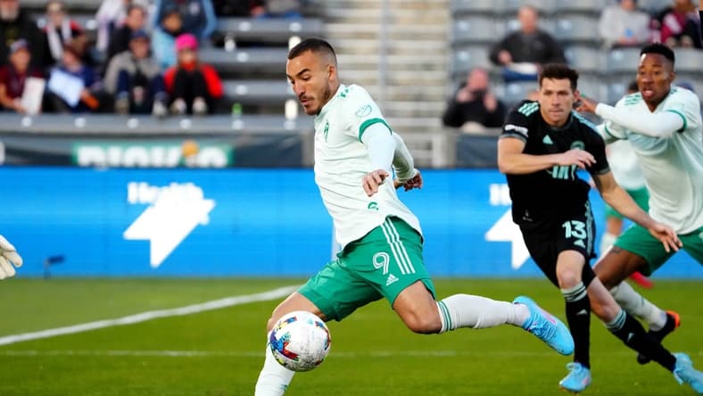 Apr 23, 2022; Commerce City, Colorado, USA; Colorado Rapids forward Andre Shinyashiki (9) prepares to kick the ball in the first half against Charlotte FC at Dick's Sporting Goods Park. Mandatory Credit: Ron Chenoy-USA TODAY Sports