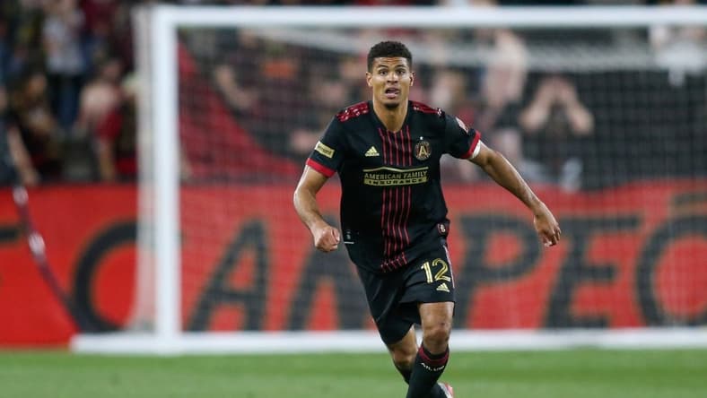 Apr 20, 2022; Kennesaw, Georgia, USA; Atlanta United defender Miles Robinson (12) dribbles against Chattanooga FC in the second half at Fifth Third Bank Stadium. Mandatory Credit: Brett Davis-USA TODAY Sports
