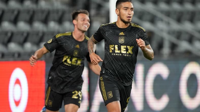 Apr 20, 2022; Los Angeles, California, USA; LAFC forward Cristian Arango (9) and forward Danny Musovski (29) celebrate after a goal against the Orange County SC in the first half at Banc of California Stadium. Mandatory Credit: Kirby Lee-USA TODAY Sports
