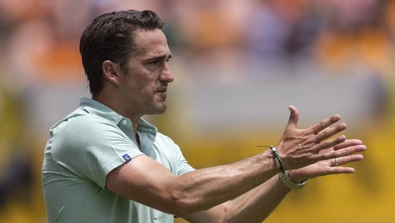 Apr 30, 2022; Houston, Texas, USA; Austin FC head coach Josh Wolff calls a play against the Houston Dynamo FC in the first half at PNC Stadium. Mandatory Credit: Thomas Shea-USA TODAY Sports