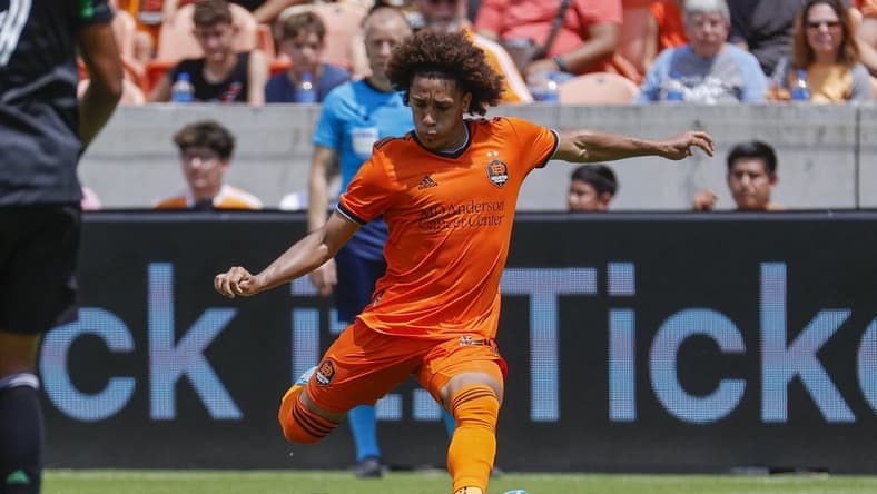 Apr 30, 2022; Houston, Texas, USA; Houston Dynamo FC midfielder Adalberto Carrasquilla (20) in action during the match against the Austin FC at PNC Stadium. Mandatory Credit: Troy Taormina-USA TODAY Sports