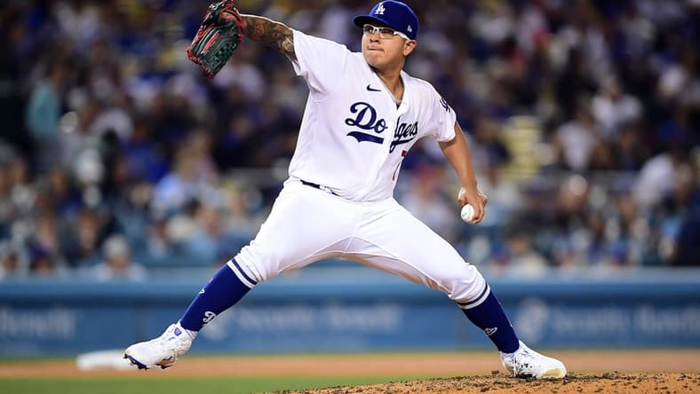 May 3, 2022; Los Angeles, California, USA; Los Angeles Dodgers starting pitcher Julio Urias (7) throws against the San Francisco Giants during the fifth inning at Dodger Stadium. Mandatory Credit: Gary A. Vasquez-USA TODAY Sports