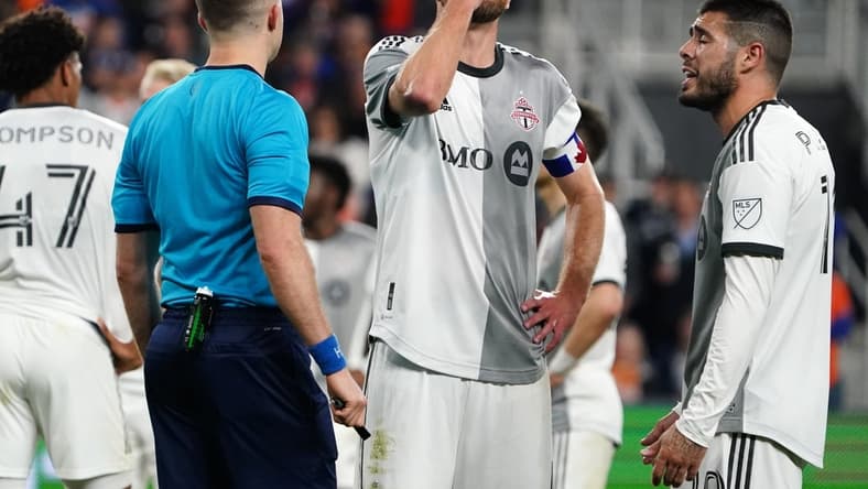 Toronto FC midfielder Michael Bradley (4) reacts after a penalty is issued in the second half during an MLS soccer match against FC Cincinnati, Wednesday, May 4, 2022, at TQL Stadium in Cincinnati. FC Cincinnati won, 2-0.

Toronto Fc At Fc Cincinnati May 4 0031