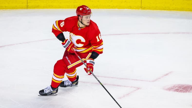 May 3, 2022; Calgary, Alberta, CAN; Calgary Flames defenseman Nikita Zadorov (16) skates with the puck against the Dallas Stars during the second period in game one of the first round of the 2022 Stanley Cup Playoffs at Scotiabank Saddledome. Mandatory Credit: Sergei Belski-USA TODAY Sports