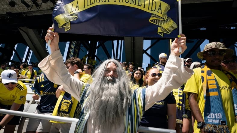 Nashville SC fan Stephen Mason dressed as Moses holds a sign above fans during first half at Geodis Park in Nashville, Tenn., Sunday, May 1, 2022. The game was Nashville SC   s first in the new stadium.

Nas Nashvillesc Philadelphia Moses 001