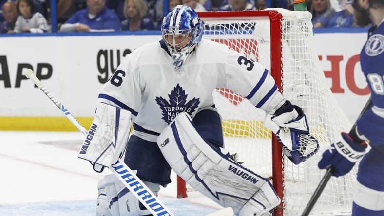 May 6, 2022; Tampa, Florida, USA; Toronto Maple Leafs goaltender Jack Campbell (36) defends the puck against the Tampa Bay Lightning during the third period of game three of the first round of the 2022 Stanley Cup Playoffs against the Tampa Bay Lightning at Amalie Arena. Mandatory Credit: Kim Klement-USA TODAY Sports