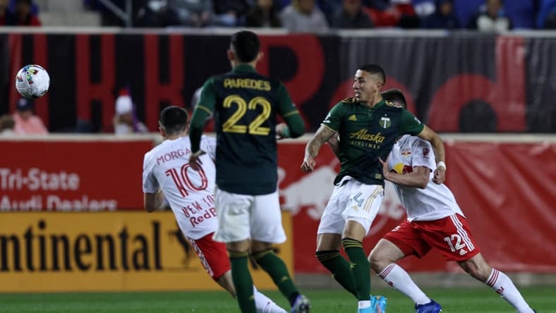 May 7, 2022; Harrison, New Jersey, USA;  Portland Timbers midfielder Marvin Lor  a (44) handles the ball against New York Red Bulls defender Dylan Nealis (12) during the second half at Red Bull Arena. Mandatory Credit: Vincent Carchietta-USA TODAY Sports