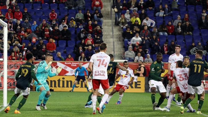 May 7, 2022; Harrison, New Jersey, USA;  New York Red Bulls midfielder Aaron Long (33) scores a goal during the second half against the Portland Timbers at Red Bull Arena. Mandatory Credit: Vincent Carchietta-USA TODAY Sports