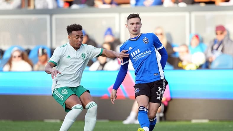 May 7, 2022; San Jose, California, USA; San Jose Earthquakes defender Paul Marie (3) passes against Colorado Rapids forward Jonathan Lewis (7) during the first half at PayPal Park. Mandatory Credit: Darren Yamashita-USA TODAY Sports