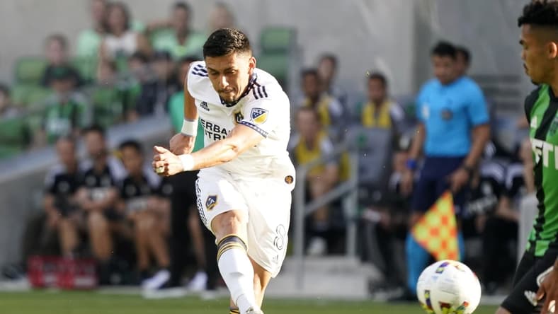 May 8, 2022; Austin, Texas, USA; Los Angeles Galaxy midfielder Marco Delgado (8) scores a goal in the first half against the Los Angeles Galaxy at Q2 Stadium. Mandatory Credit: Scott Wachter-USA TODAY Sports