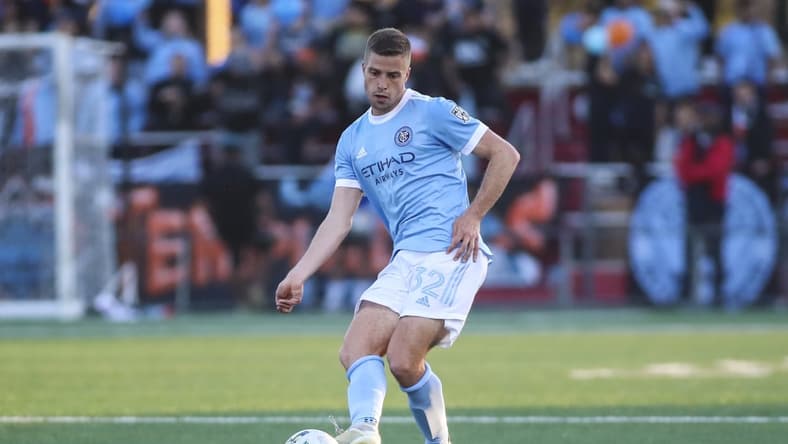 May 11, 2022; Jamaica, New York, USA;  New York City FC defender Vuk Latinovich (32) controls the ball in the first half against Rochester New York FC at Belson Stadium. Mandatory Credit: Wendell Cruz-USA TODAY Sports