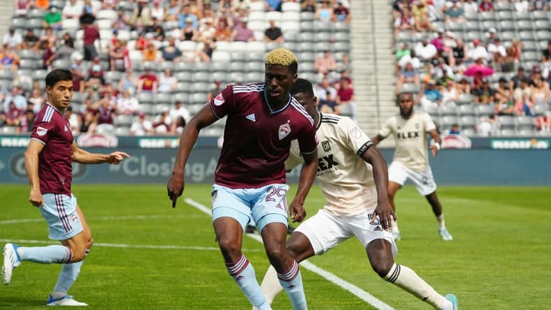 May 14, 2022; Commerce City, Colorado, USA; Los Angeles FC defender Mamadou Fall (5) and Colorado Rapids forward Gyasi Zardes (29) during the second half against Los Angeles FC at Dick's Sporting Goods Park. Mandatory Credit: Ron Chenoy-USA TODAY Sports