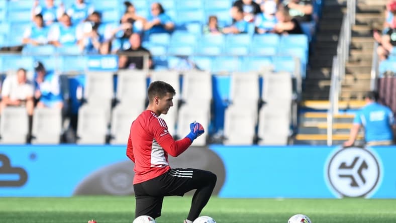 May 14, 2022; Charlotte, North Carolina, USA; Charlotte FC goalkeeper George Marks (31) warms up before a match against CF Montreal at Bank of America Stadium. Mandatory Credit: Griffin Zetterberg-USA TODAY Sports