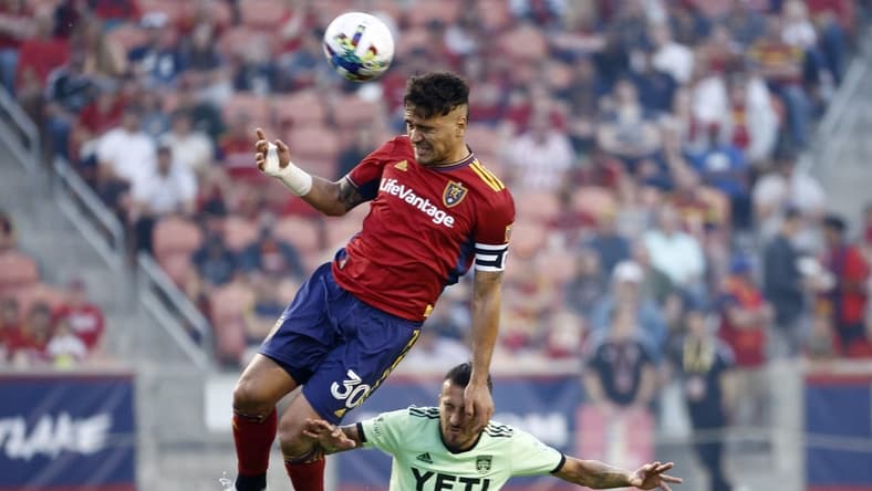May 14, 2022; Sandy, Utah, USA; Real Salt Lake defender Marcelo Silva (30) goes up for the ball against Austin FC forward Maximiliano Urruti (37) in the first half at Rio Tinto Stadium. Mandatory Credit: Jeffrey Swinger-USA TODAY Sports