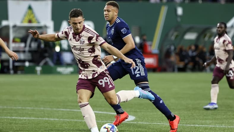 May 14, 2022; Portland, Oregon, USA; Portland Timbers forward Nathan Fogaca (99) scores a goal during the second half against the Sporting Kansas City at Providence Park. Mandatory Credit: Soobum Im-USA TODAY Sports
