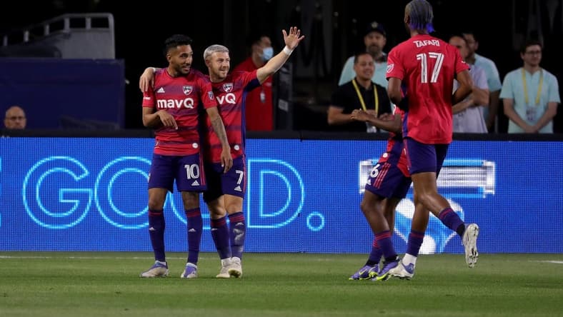 May 14, 2022; Carson, California, USA;  FC Dallas forward Jesus Ferreira (10) celebrates with forward Paul Arriola (7) after scoring against the LA Galaxy during the first half at Dignity Health Sports Park. Mandatory Credit: Kiyoshi Mio-USA TODAY Sports