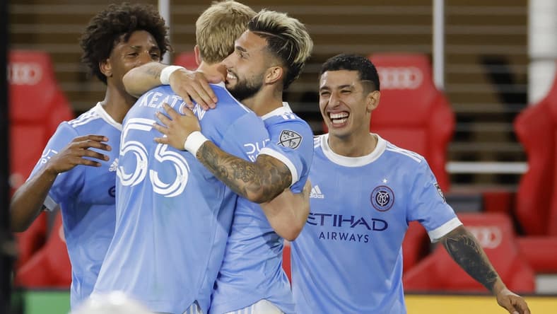 May 18, 2022; Washington, District of Columbia, USA; New York City FC midfielder Valent n Castellanos (11) celebrates with teammates after scoring a goal on a penalty kick against D.C. United in the first half at Audi Field. Mandatory Credit: Geoff Burke-USA TODAY Sports