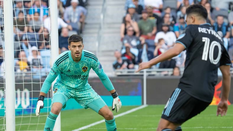 May 18, 2022; Saint Paul, Minnesota, USA; Minnesota United midfielder Emanuel Reynoso (10) shoots on Los Angeles Galaxy goalkeeper Jonathan Bond (1) in the first half at Allianz Field. Mandatory Credit: Matt Blewett-USA TODAY Sports