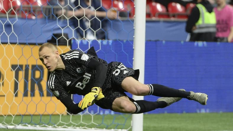 May 18, 2022; Vancouver, British Columbia, CAN;  Vancouver Whitecaps goaltender Cody Cropper (55) dives for the ball against the FC Dallas during the second half at BC Place. Mandatory Credit: Anne-Marie Sorvin-USA TODAY Sports