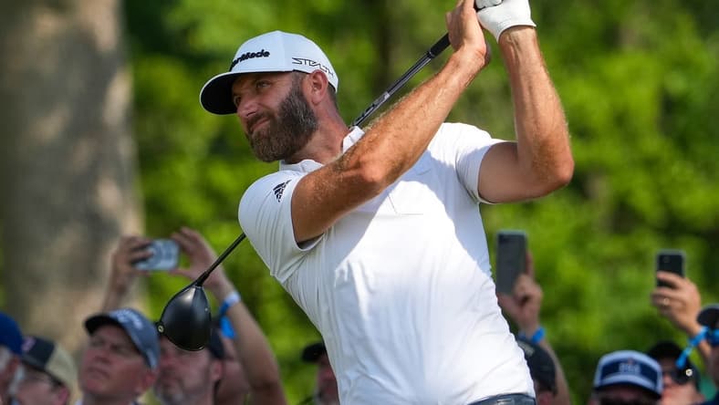 May 19, 2022; Tulsa, OK, USA; Dustin Johnson plays a shot on the 13th tee during the first round of the PGA Championship golf tournament at Southern Hills Country Club. Mandatory Credit: Michael Madrid-USA TODAY Sports