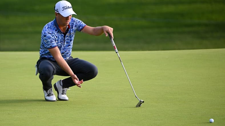 May 20, 2022; Tulsa, OK, USA;  Justin Thomas lines up his putt on the 10th green during the second round of the PGA Championship golf tournament at Southern Hills Country Club. Mandatory Credit: Orlando Ramirez-USA TODAY Sports