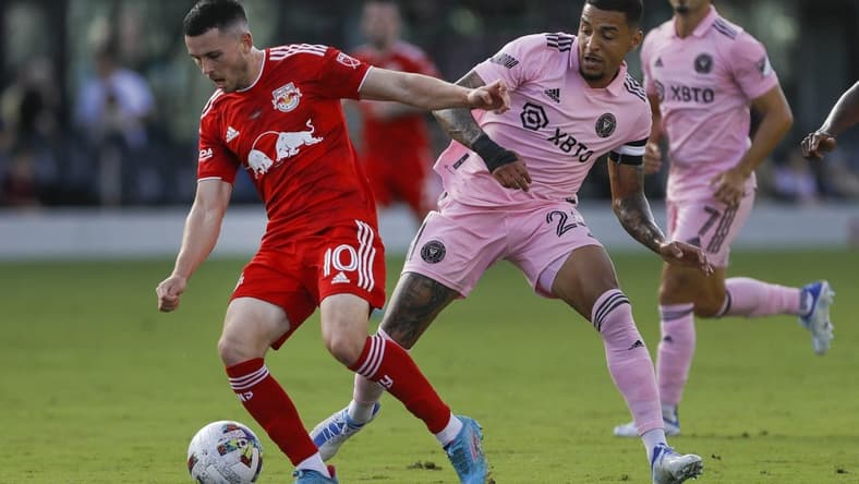 May 22, 2022; Fort Lauderdale, Florida, USA; New York Red Bulls midfielder Lewis Morgan (10) protects the ball from Inter Miami CF midfielder Gregore (26) during the first half at DRV PNK Stadium. Mandatory Credit: Sam Navarro-USA TODAY Sports