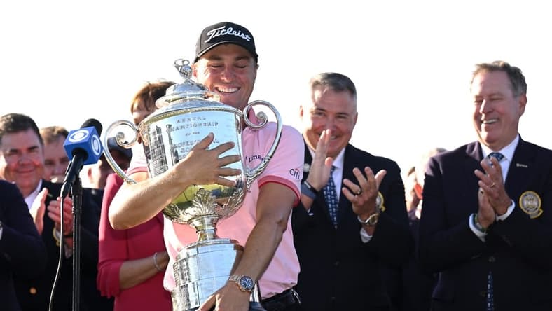 May 22, 2022; Tulsa, Oklahoma, USA; Justin Thomas poses with the Wanamaker trophy after winning the PGA Championship golf tournament at Southern Hills Country Club. Mandatory Credit: Orlando Ramirez-USA TODAY Sports