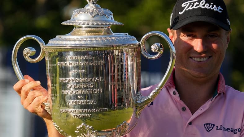May 22, 2022; Tulsa, Oklahoma, USA; Justin Thomas holds the Wanamaker Trophy after winning the PGA Championship golf tournament in a three hole playoff. Mandatory Credit: Michael Madrid-USA TODAY Sports