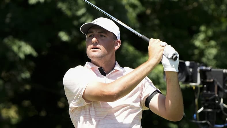 May 27, 2022; Fort Worth, Texas, USA; Scottie Scheffler plays his shot from the eighth tee during the second round of the Charles Schwab Challenge golf tournament. Mandatory Credit: Jim Cowsert-USA TODAY Sports