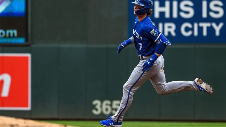 May 28, 2022; Minneapolis, Minnesota, USA; Kansas City Royals shortstop Bobby Witt (7) runs to second on an RBI double against the Minnesota Twins during the third inning at Target Field. Mandatory Credit: Nick Wosika-USA TODAY Sports