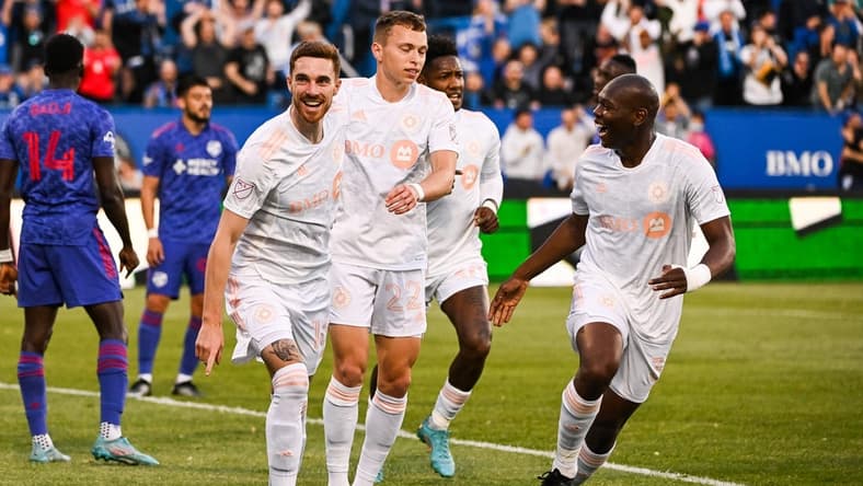 May 28, 2022; Montreal, Quebec, CAN; CF Montreal defender Joel Waterman (16) celebrates after scoring a goal during the first half at Stade Saputo. Mandatory Credit: David Kirouac-USA TODAY Sports