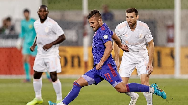 May 28, 2022; Commerce City, Colorado, USA; Colorado Rapids forward Diego Rubio (11) controls the ball as Nashville SC defender Dave Romney (4) defends in the first half at Dick's Sporting Goods Park. Mandatory Credit: Isaiah J. Downing-USA TODAY Sports