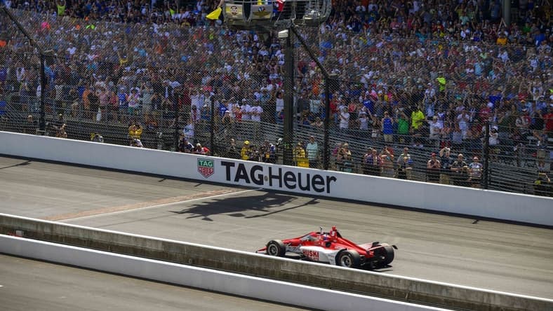 May 29, 2022; Indianapolis, Indiana, USA; Chip Ganassi Racing driver Marcus Ericsson (8) of Sweden crosses the finish line and wins the106th running of the Indianapolis 500 at Indianapolis Motor Speedway. Mandatory Credit: Jerome Miron-USA TODAY Sports