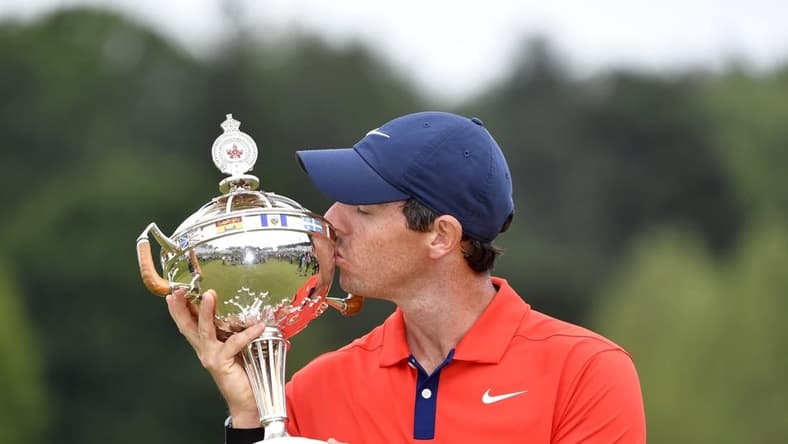 Jun 9, 2019; Hamilton, Ontario, CAN; Rory McIlroy poses with the trophy after winning the 2019 RBC Canadian Open golf tournament at Hamilton Golf & Country Club. Mandatory Credit: Eric Bolte-USA TODAY Sports